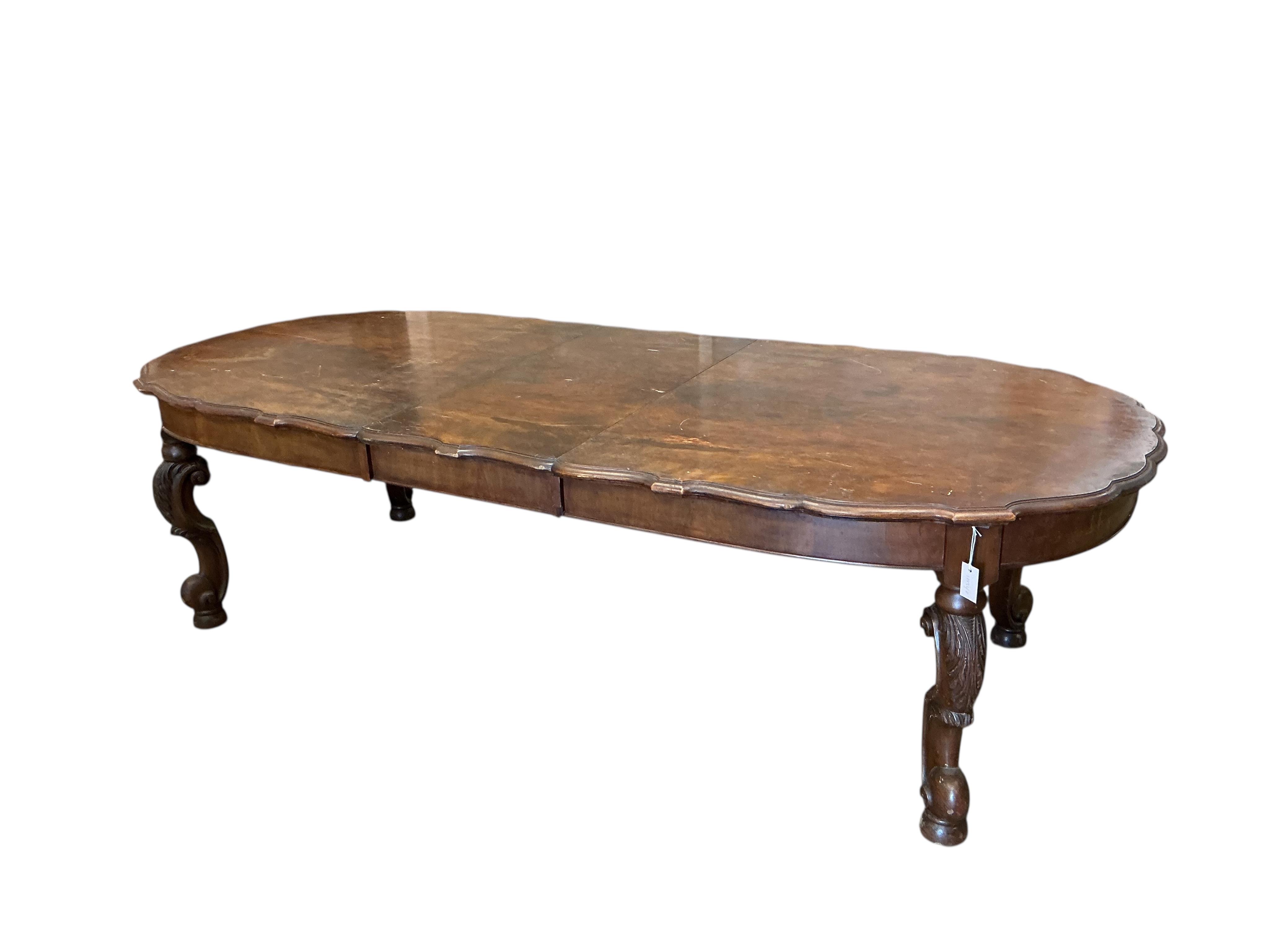 A late 19th century Continental walnut extending dining table, 264cm extended, one spare leaf, depth 114cm, height 73cm